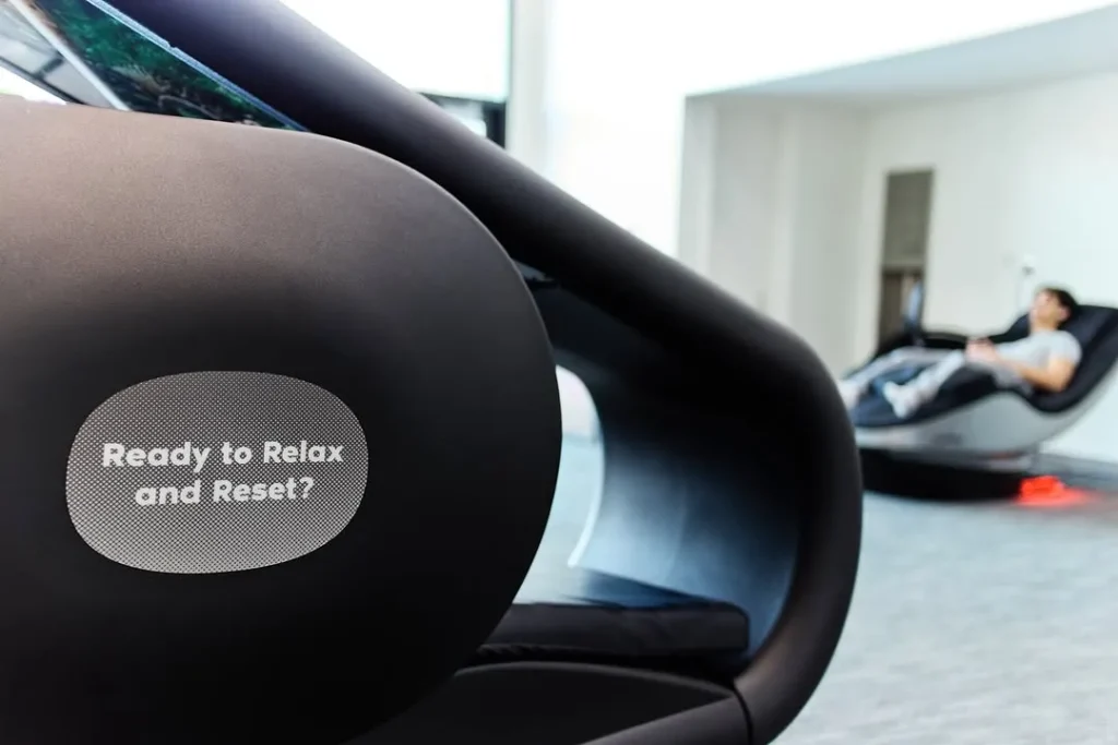 Closeup on side of a RelaxSpace Wellness Pod, which says "Ready to Relax and Reset?"