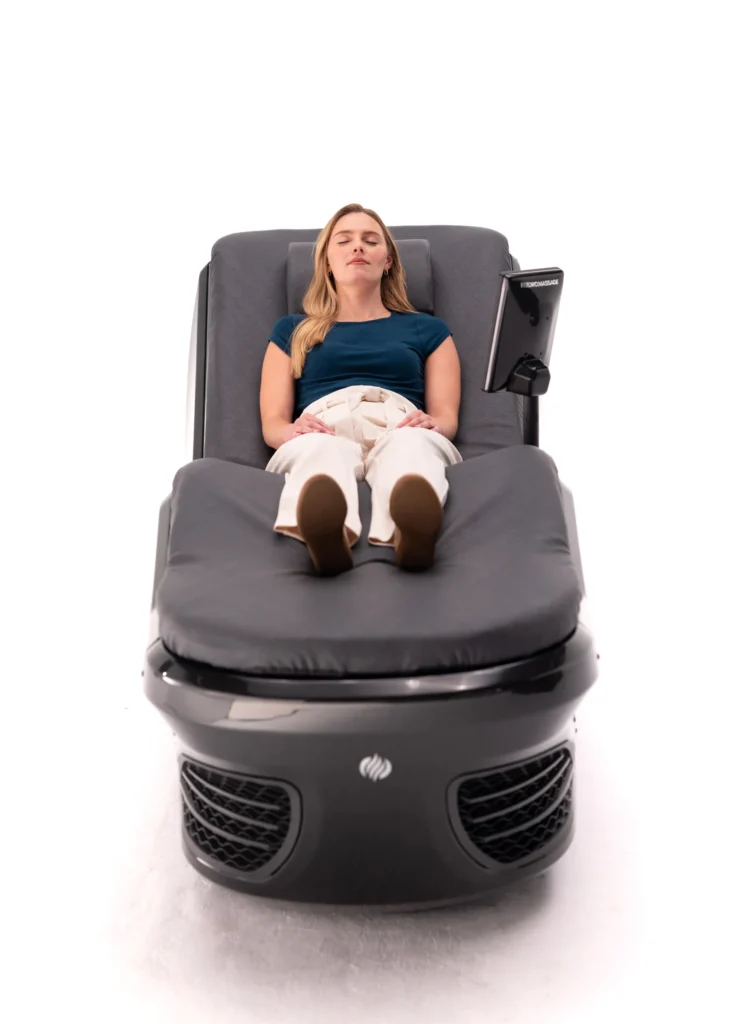 Woman lying on a HydroMassage lounge