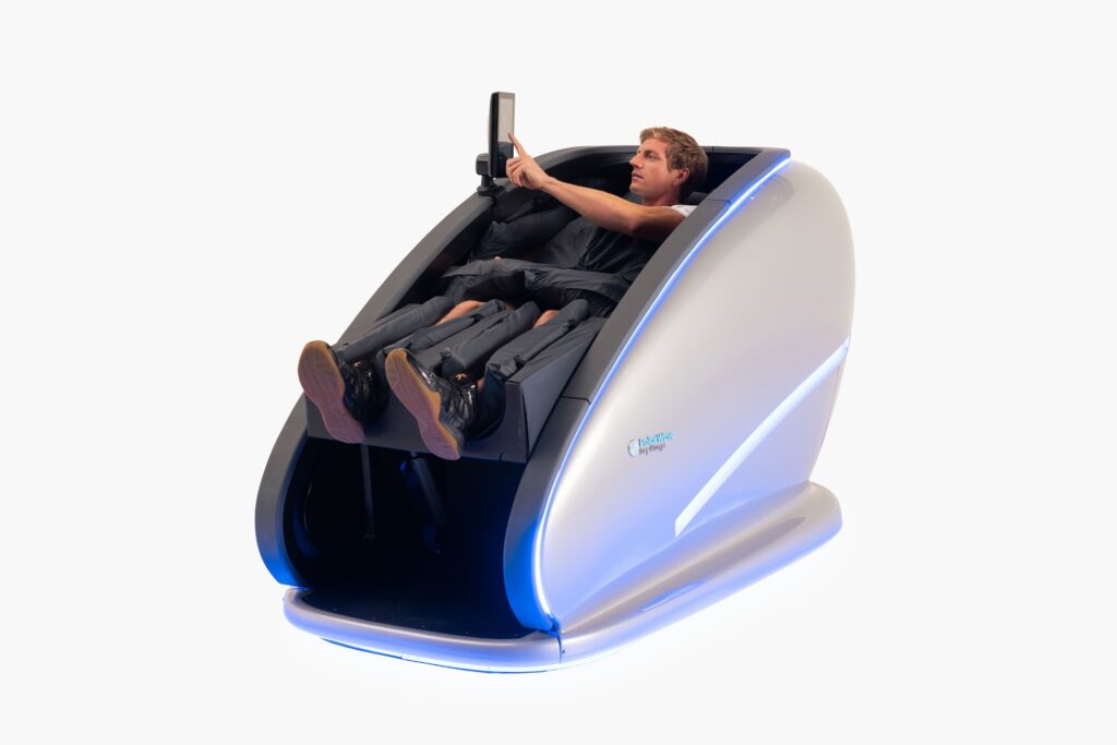 Man sitting in PolarWave dry cold plunge